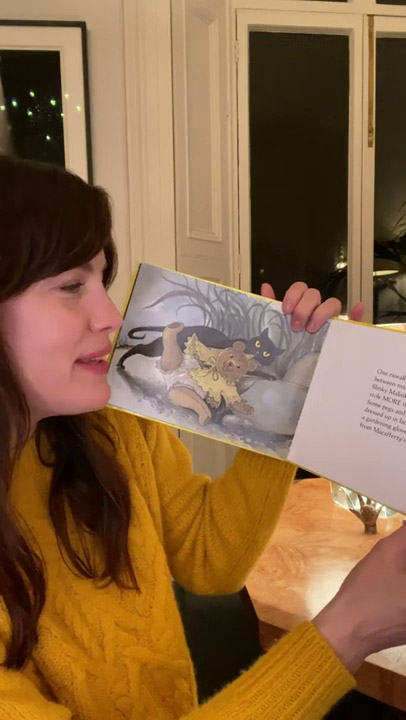 Reading 'Slinky Malinki ' by Lynley Dodd, for 'Save The Chirdren' charity