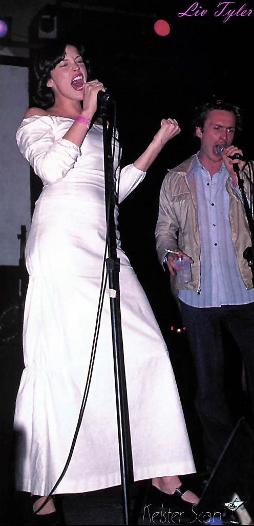 Liv singing with her fiance