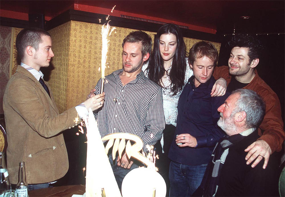 with LOTR cast - celebrating Dominic Monaghan's birthday, Paris, December 10th 2002