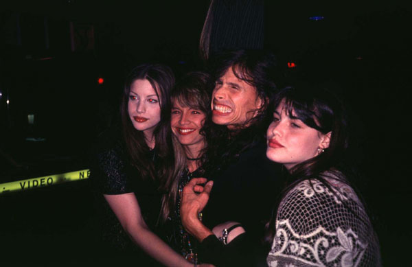 with sister Mia, dad Steven and his wife - Teresa