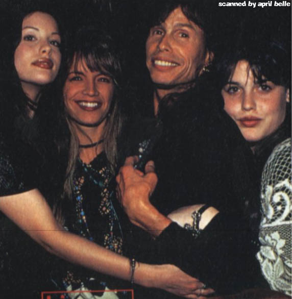 with sister Mia, dad Steven and his wife - Teresa