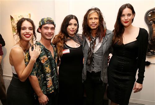 with sister Chelsea, brother Taj, sister Mia and dad Steven Tyler