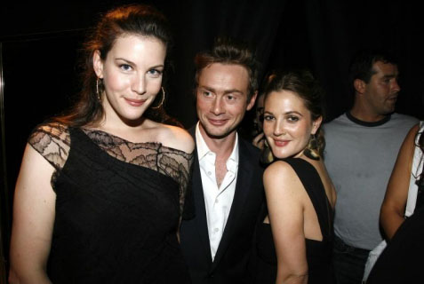 with husband Royston Langdon and Drew Barrymore