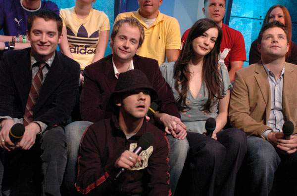 with Elijah Wood, Billy Boyd, Dominic Monaghan and Sean Astin - at MTV TRL, December 16th 2003