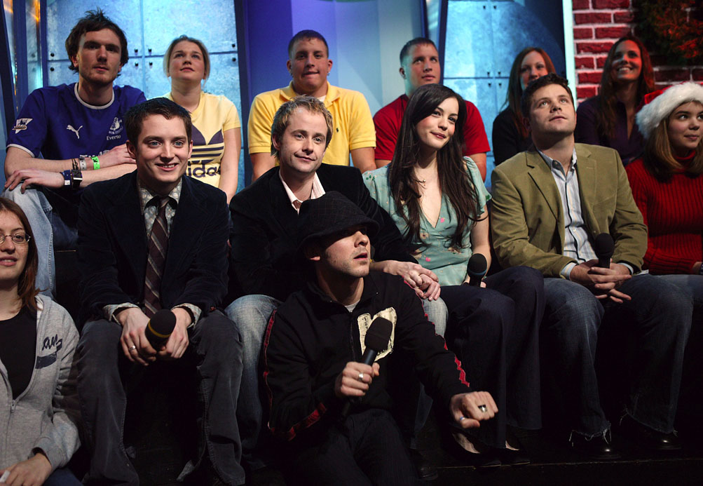 with Elijah Wood, Billy Boyd, Dominic Monaghan and Sean Astin - at MTV TRL, December 16th 2003